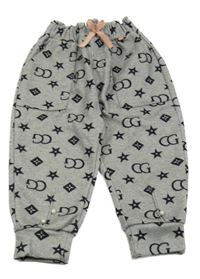 Sivé teplákové nohavice s logy Gucci