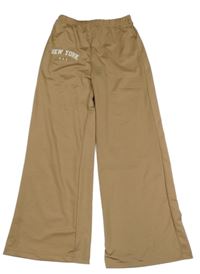 Béžové nohavice s nápisom