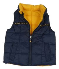 Tmavomodrá šušťáková zateplená obojstranná vesta s nápisom C&A