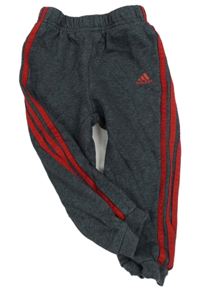 Tmavošedé tepláky s červenými pruhy Adidas