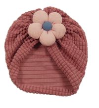 Ružová vzorovaná turbanová čapica s květem
