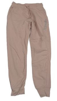 Starorůžové tepláky s nápisem