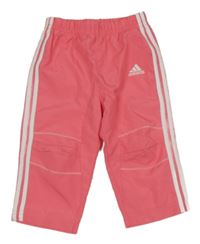 Růžové šusťákové podšité kalhoty s pruhy a logem Adidas