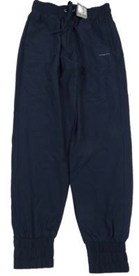 Nové - Tmavomodré ľahké šušťákové cuff nohavice s logom LA Gear