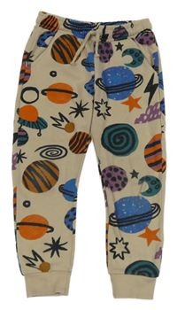 Béžovo-barevné tepláky s planetami F&F