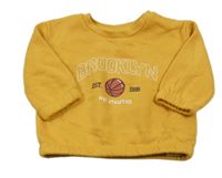 Horčicová mikina s nápisom a loptou Primark