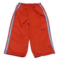 Červené sportovní tepláky s proužkem