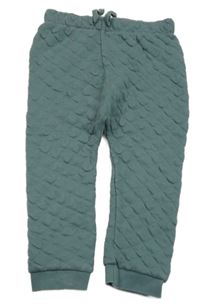 Tmavozelené prošívané tepláky Nutmeg