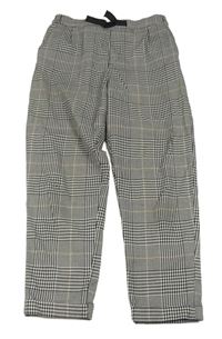 Bielo-čierno-okrové kockované teplákové nohavice H&M