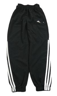 Čierne šušťákové nohavice s logom Adidas