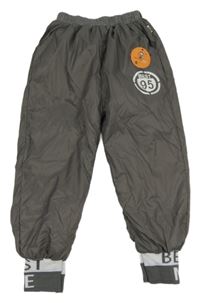 Nové - tmavošedé šusťákové thermo kalhoty s číslem a nápisy