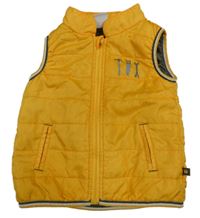 Tmavožltá prešívaná šušťáková zateplená vesta s nářadím BUBBLE GUM