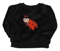 Čierna chlpatá mikina s lienkou