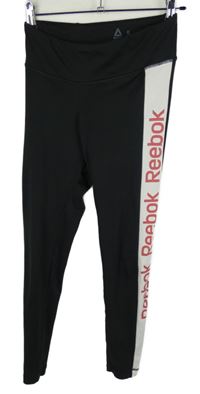 Dámské černo-bílé sportovní legíny s logy Reebok 