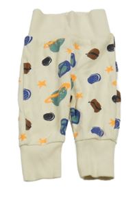 Krémové rebrované tepláky s planetami Topomini