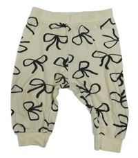 Smotanové tepláky s mašličkami