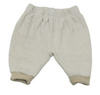 Bielo-hnedé pruhované podšité tepláky