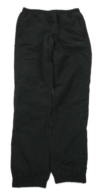 Čierne šušťákové podšité nohavice s logom Slazenger