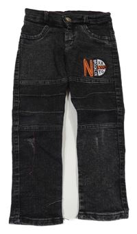 Čierne skinny rifle s nášivkou