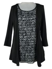 Dámské černo-bílé vzorované triko s volánky BM 