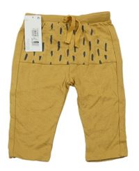 Nové - Hořčicové lehké tepláky s flíčky M&S