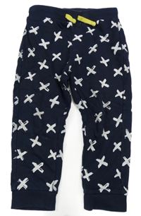 Tmavomodré tepláky s bílými křížky Blu Kids