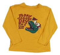 Pomerančové triko s dinosaurem a nápisy PRIMARK