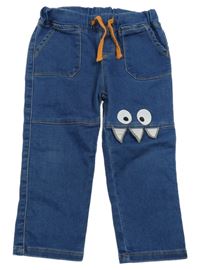 Modré teplákové rifle s príšerkou