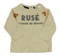 Béžové tričko s nápisom Orchestra