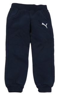 Tmavomodré tepláky s logem Puma