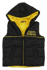 Černo-žlutá šusťáková prošívaná zateplená vesta s Batmanem a kapucí 