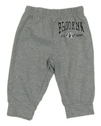 Sivé melírované ľahké tepláky s nápisom