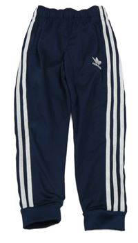 Tmavomdoro-bílé sportovní tepláky s pruhy a logem Adidas