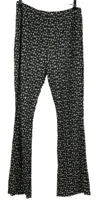 Dámske čierno-smotanové vzorované plisované zvonové nohavice TU