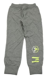 Šedé melírované tepláky s potiskem iDO