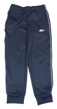 Tmavomodré sportovní tepláky s logem Nike