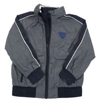 Tmavomodro-bílá šusťáková jarní bunda 