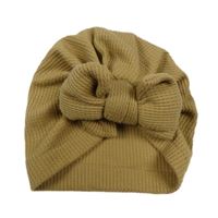 Hnědobéžová vzorovaná turbanová čapica s mašlou