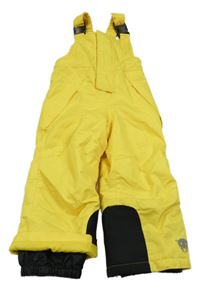 Žluto-černé šusťákové zimní laclové oteplovačky s medvedíkom lupilu