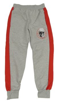 Šedo-červené tepláky s lebkou 