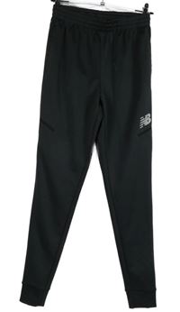 Pánske tmavosivé športové tepláky New Balance