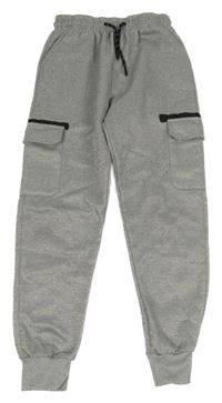 Světlešedé tepláky s kapsami 