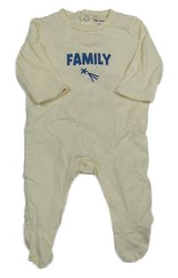 Smetanový overal s nápisem KIABI