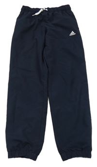 Tmavomodré šušťákové nohavice s logom Adidas