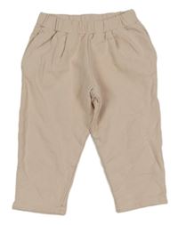 Světlepudrové tepláky COS