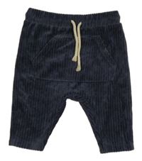 Tmavomodré rebrované zamatové nohavice s vreckom Zara