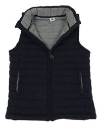 Tmavomodrá zateplená prošívaná tepláková vesta 