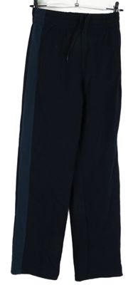 Dámské tmavomodré tepláky s pruhy UniQlo 