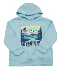Světlemodrá teplá mikina s horami a nápisy a kapucí St. Bernard