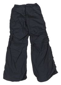 Tmavomodré šusťákové kalhoty H&M